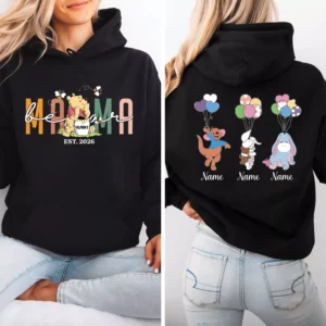 Black personalized Mama hoodie featuring Winnie the Pooh-inspired front print and custom character balloon design on the back.