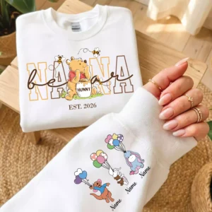 White personalized Nana sweatshirt featuring Winnie the Pooh-inspired front design and custom family character sleeve print.
